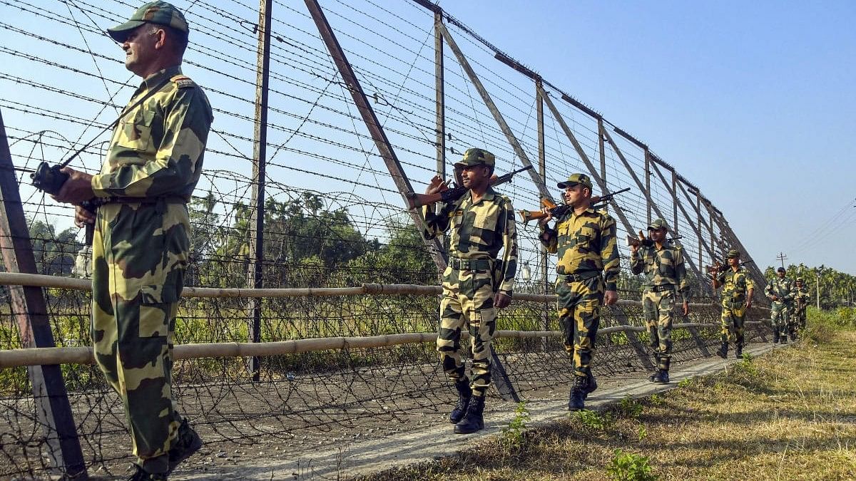 <div class="paragraphs"><p>Border Security Force personnel patrol along the India-Bangladesh border. </p></div>